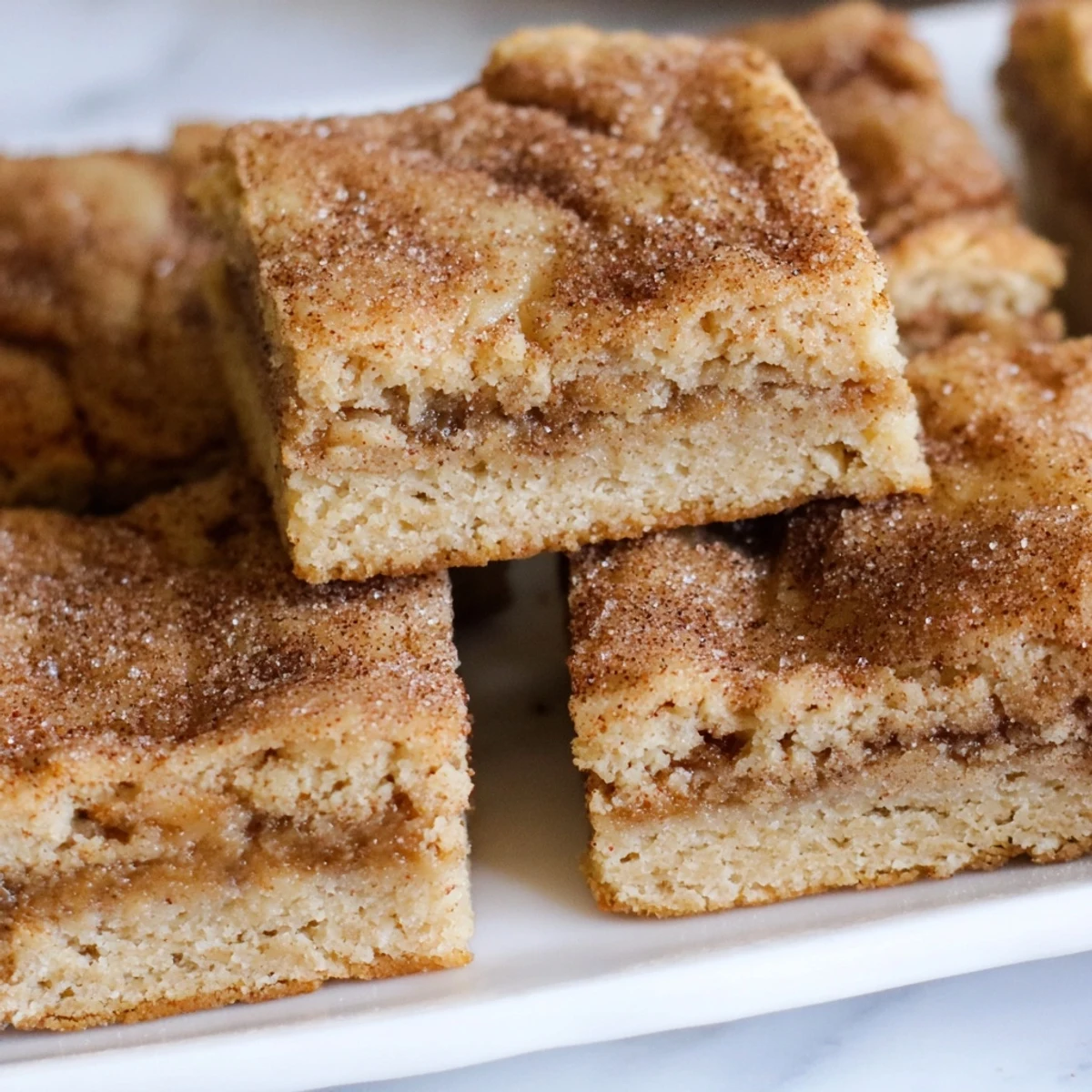 Deliciously chewy blondies infused with sweet tea, topped with cinnamon sugar crunch.  