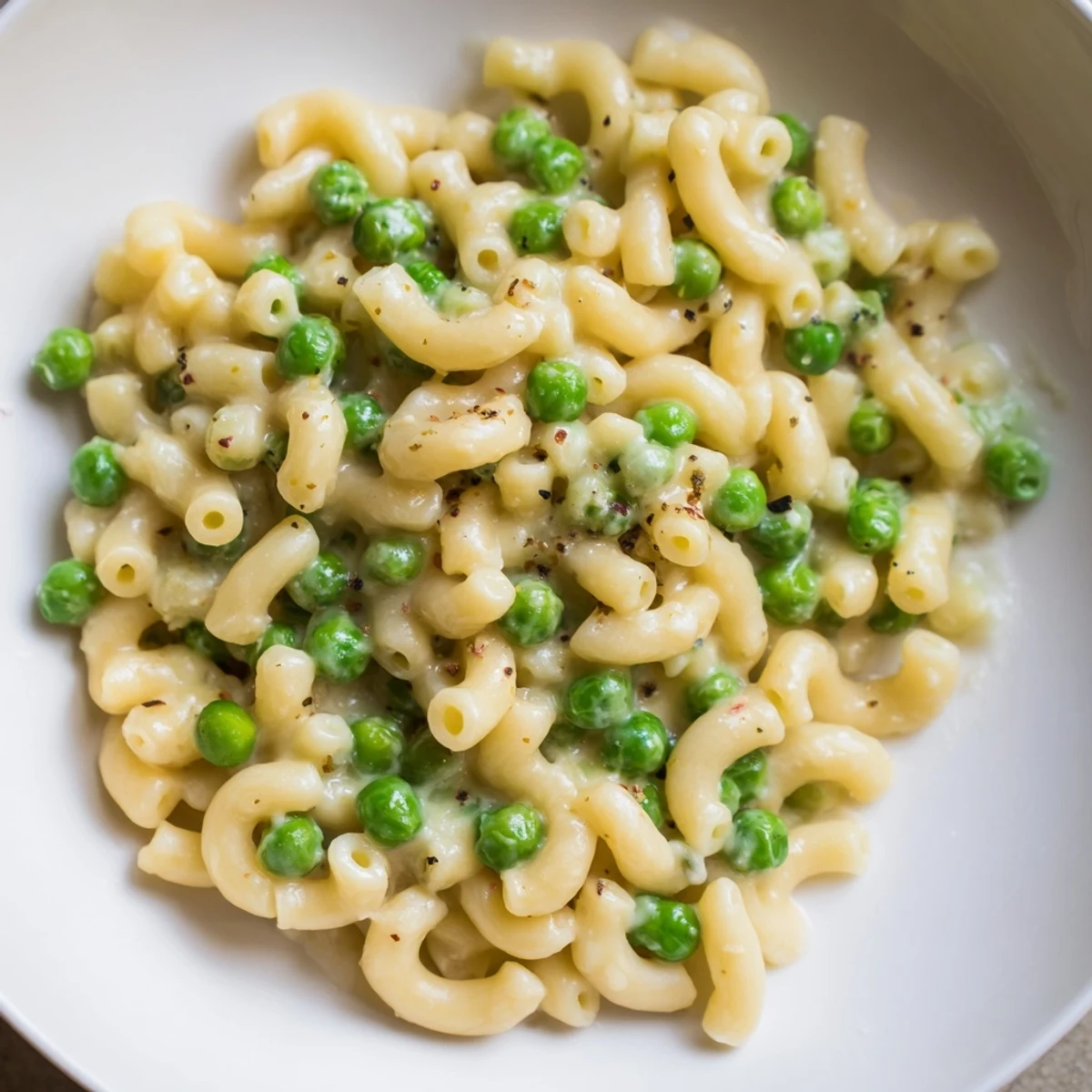 Close-up of Macaroni & Peas: tender pasta with sweet peas and Parmesan cheese.