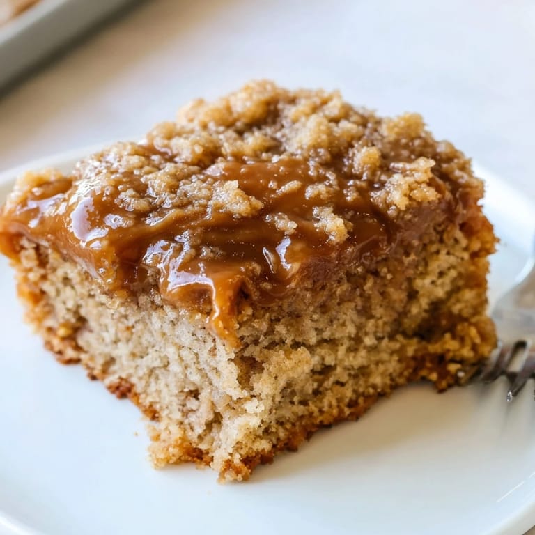 Delightful slice of caramel banana root beer sheet cake with rich frosting.  