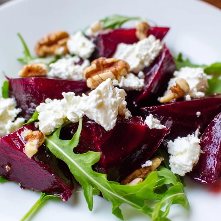 Serve this Roasted Beet Goat Cheese Salad with chilled white wine for a vibrant, easy weeknight dinner or special occasion.