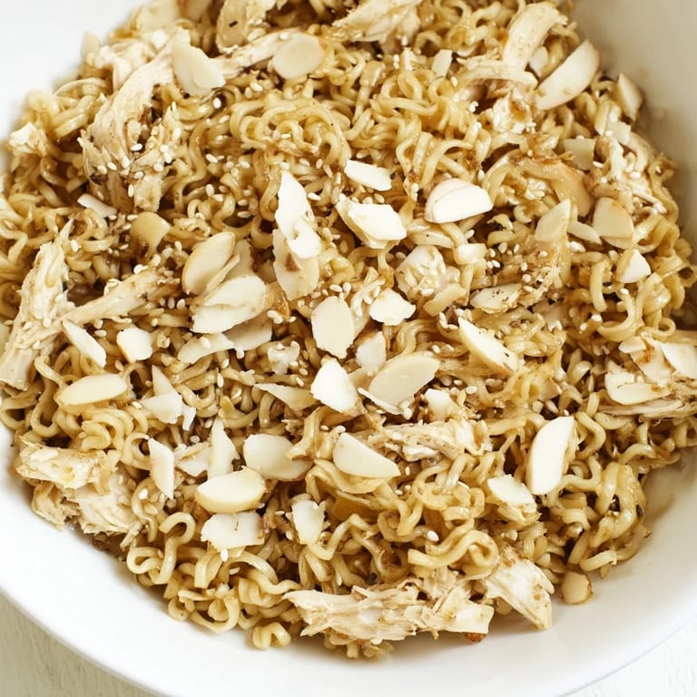 Perfect for a quick lunch or potluck, this Crunchy Ramen Chicken Salad features crisp veggies, crunchy noodles, and savory rotisserie chicken.